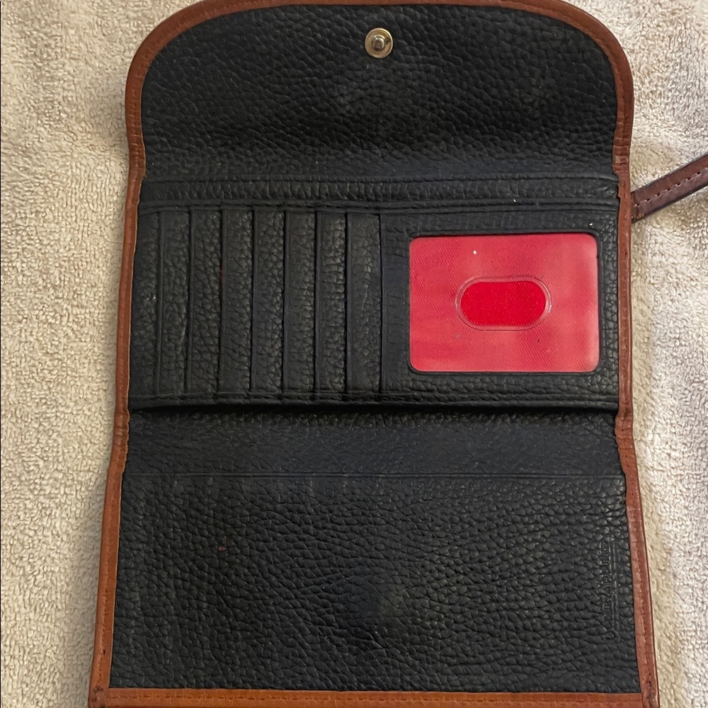 Dooney & Bourke Textured Black Wallet with Brown Trim - Picture 2 of 4